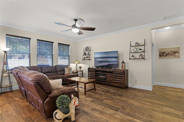 418 Rock Springs Cir, Groveland, FL 34736 - living room with a ceiling fan, crown molding, hardwood / wood-style flooring, and a textured ceiling