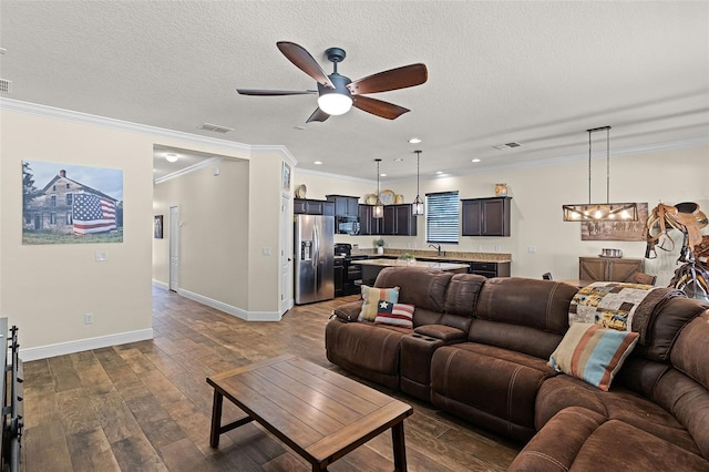 418 Rock Springs Cir, Groveland, FL 34736 - living area with a ceiling fan, dark wood-type flooring, recessed lighting, crown molding, and a textured ceiling