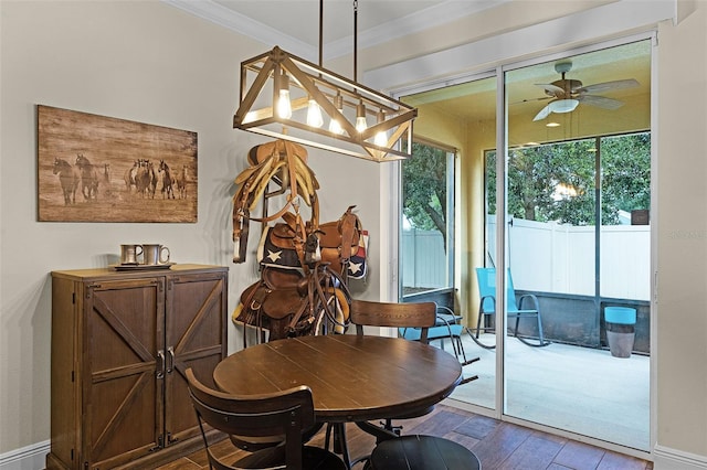 418 Rock Springs Cir, Groveland, FL 34736 - dining room with a ceiling fan, crown molding, and wood finished floors