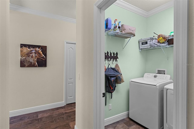 418 Rock Springs Cir, Groveland, FL 34736 - washroom with crown molding, washing machine and clothes dryer, and dark wood-style flooring