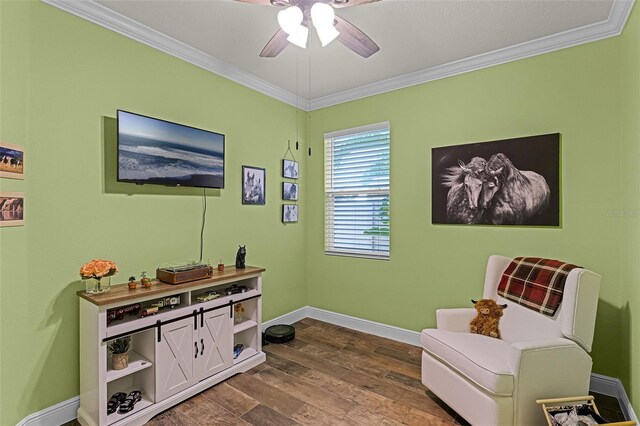 418 Rock Springs Cir, Groveland, FL 34736 - sitting room featuring ornamental molding, a ceiling fan, and dark wood finished floors
