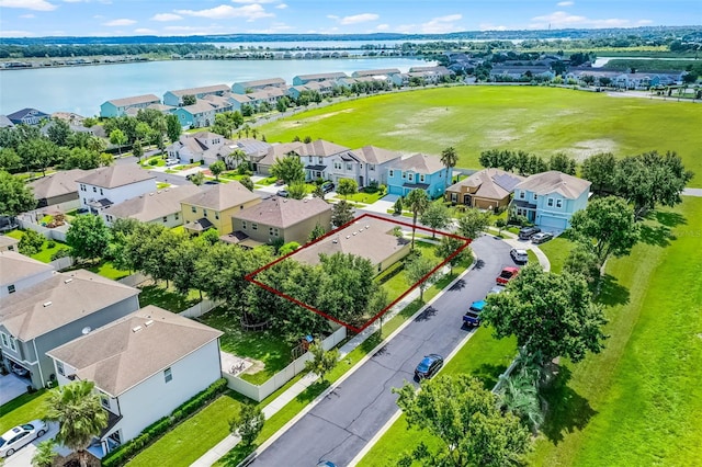 418 Rock Springs Cir, Groveland, FL 34736 - aerial view of residential area with property boundaries highlighted and a nearby body of water
