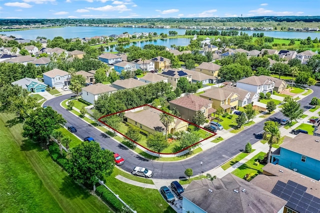 418 Rock Springs Cir, Groveland, FL 34736 - aerial perspective of suburban area featuring property parcel outlined and a nearby body of water