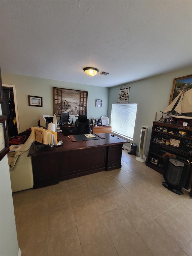 2611 Hiawatha Ave, Sanford, FL 32773 - office area featuring light tile patterned flooring and a textured ceiling