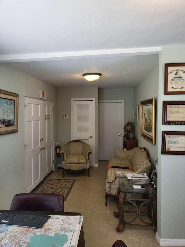 2611 Hiawatha Ave, Sanford, FL 32773 - tiled living room featuring baseboards