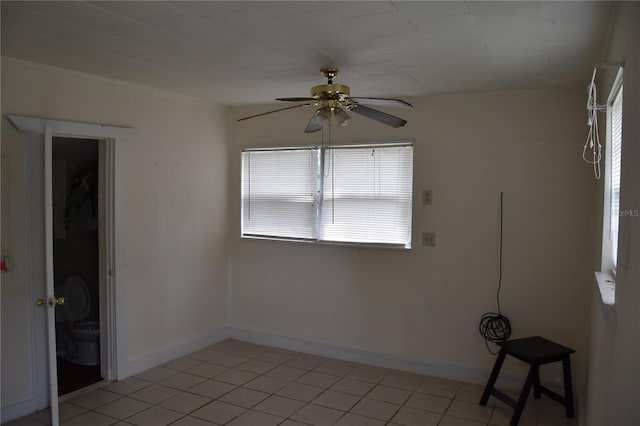 2611 Hiawatha Ave, Sanford, FL 32773 - spare room with a ceiling fan and light tile patterned floors