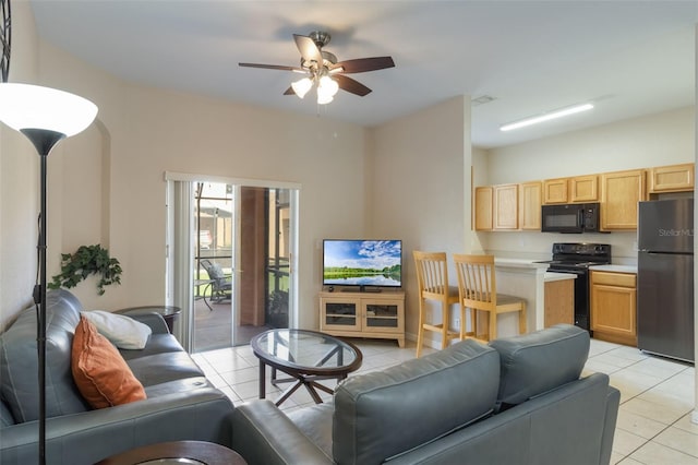 2717 Bushman Dr, Kissimmee, FL 34746 - living area with light tile patterned floors and ceiling fan