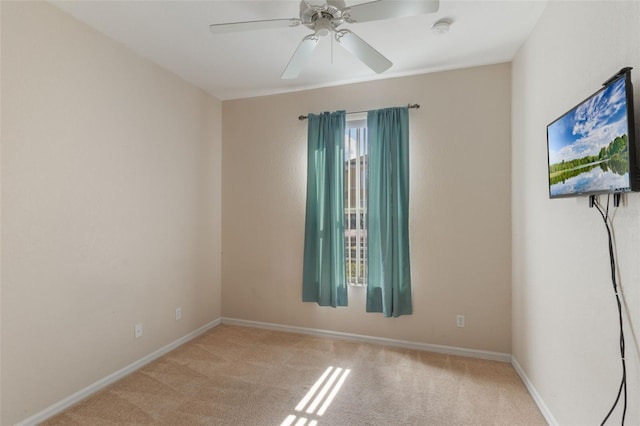 2717 Bushman Dr, Kissimmee, FL 34746 - spare room featuring carpet flooring, a smoke detector, and ceiling fan