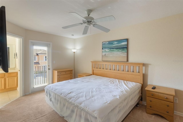 2717 Bushman Dr, Kissimmee, FL 34746 - bedroom with light carpet, ceiling fan, access to outside, and ensuite bath