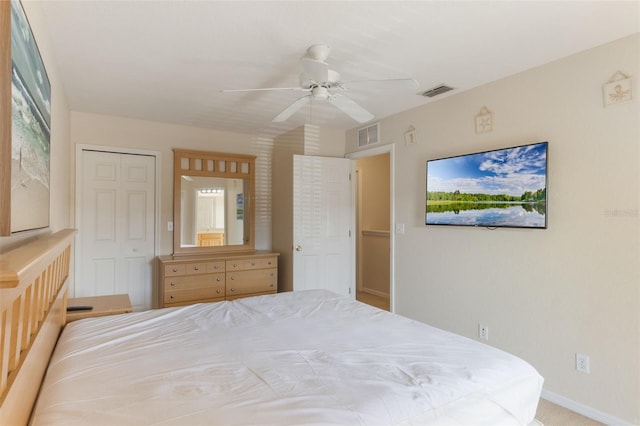 2717 Bushman Dr, Kissimmee, FL 34746 - bedroom with a ceiling fan, a closet, and carpet floors
