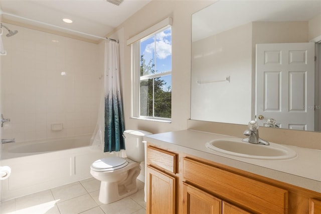 2717 Bushman Dr, Kissimmee, FL 34746 - full bath featuring tile patterned flooring, shower / bath combination with curtain, vanity, and recessed lighting