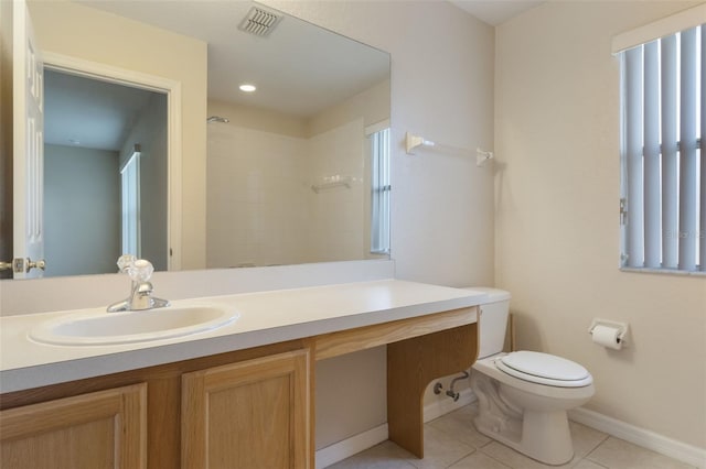 2717 Bushman Dr, Kissimmee, FL 34746 - bathroom featuring vanity, tile patterned floors, and a shower