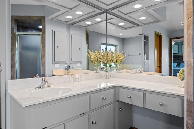 14325 Manchester Ave, Groveland, FL 34736 - ensuite bathroom featuring double vanity, a stall shower, and recessed lighting