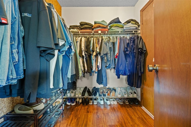 14325 Manchester Ave, Groveland, FL 34736 - spacious closet featuring wood finished floors