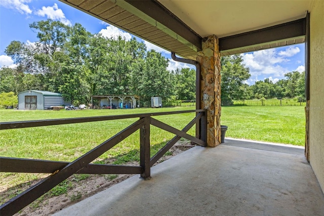 14325 Manchester Ave, Groveland, FL 34736 - view of patio / terrace with view of wooded area