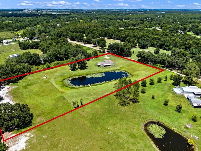 14325 Manchester Ave, Groveland, FL 34736 - aerial view of property and surrounding area with a large body of water and property boundaries highlighted