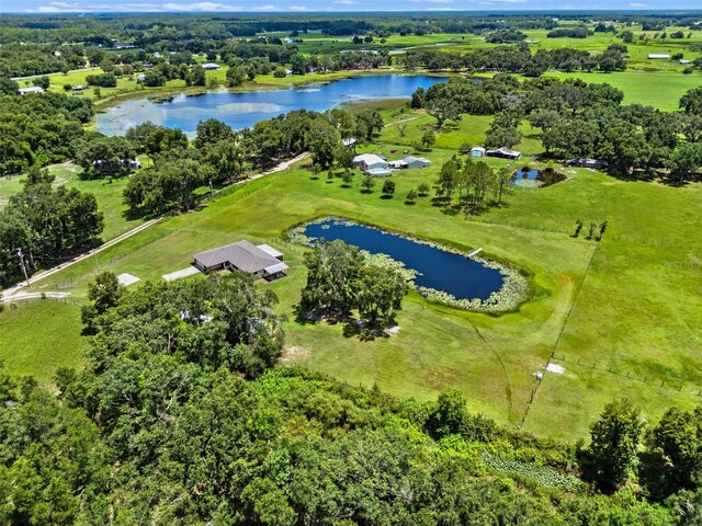 14325 Manchester Ave, Groveland, FL 34736 - aerial view of a nearby body of water and a tree filled landscape