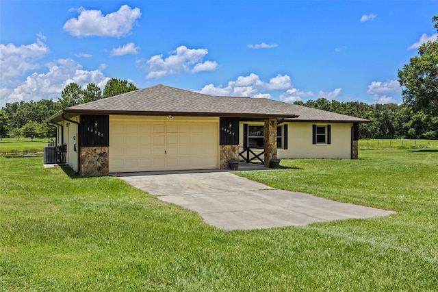 14325 Manchester Ave, Groveland, FL 34736 - ranch-style house with stone siding, an attached garage, driveway, a front lawn, and roof with shingles