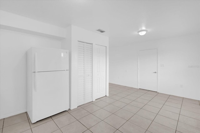 302 W Rose Ln, Lady Lake, FL 32159 - kitchen featuring freestanding refrigerator