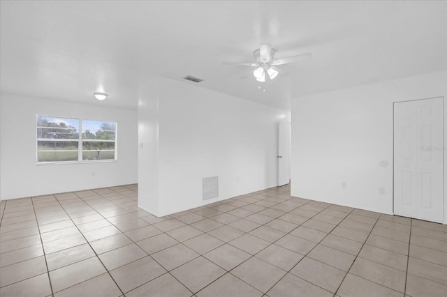 302 W Rose Ln, Lady Lake, FL 32159 - empty room featuring ceiling fan and light tile patterned floors