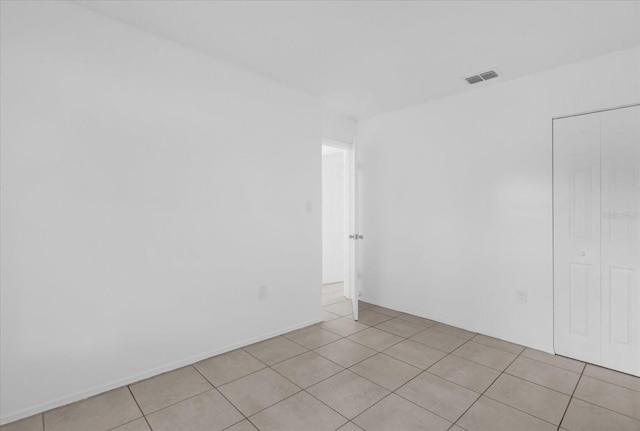 302 W Rose Ln, Lady Lake, FL 32159 - spare room featuring light tile patterned floors