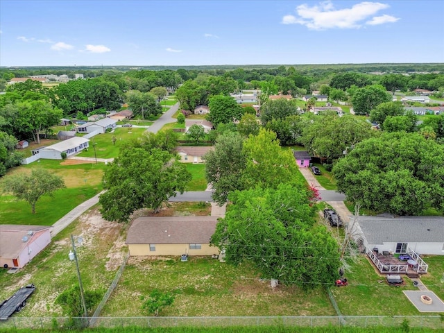 302 W Rose Ln, Lady Lake, FL 32159 - aerial perspective of suburban area featuring a tree filled landscape