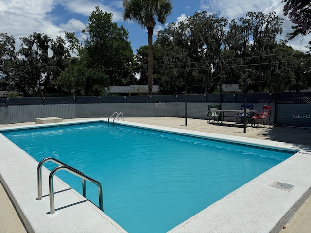 219 Magnolia Cir, Eustis, FL 32726 - view of swimming pool featuring a patio