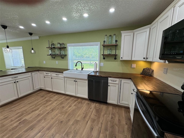 219 Magnolia Cir, Eustis, FL 32726 - kitchen with dishwashing machine, range with electric stovetop, black microwave, open shelves, and a textured ceiling