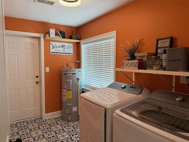 219 Magnolia Cir, Eustis, FL 32726 - washroom featuring water heater, washer and dryer, and a textured ceiling