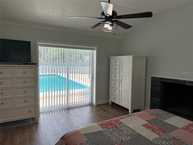 219 Magnolia Cir, Eustis, FL 32726 - bedroom with access to exterior, dark wood-style flooring, crown molding, lofted ceiling, and ceiling fan