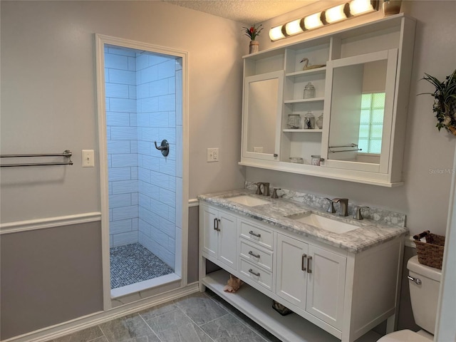 219 Magnolia Cir, Eustis, FL 32726 - full bath featuring a shower stall, double vanity, and a textured ceiling