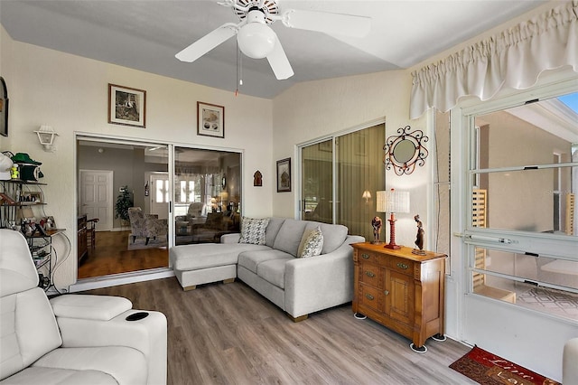 1309 Corona Ave, The Villages, FL 32159 - living area with wood finished floors, a ceiling fan, and lofted ceiling