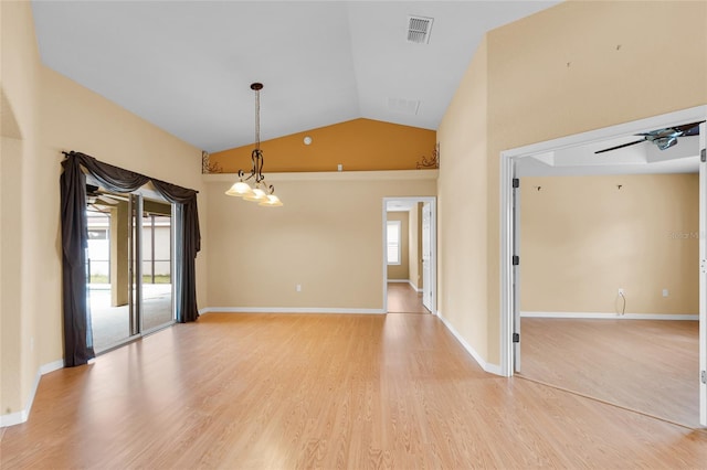 12407 NE 48th Loop, Oxford, FL 34484 - unfurnished room with light wood-style flooring, vaulted ceiling, and ceiling fan