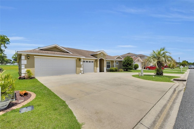 12407 NE 48th Loop, Oxford, FL 34484 - ranch-style house with stucco siding, a garage, concrete driveway, and a front lawn