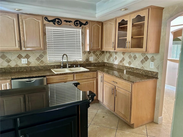 1096 Linkside Ct, Apopka, FL 32712 - kitchen with dishwasher, light tile patterned floors, dark countertops, backsplash, and glass insert cabinets