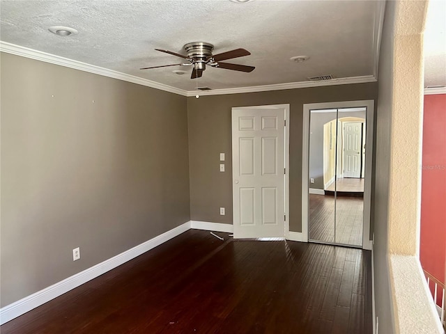 1096 Linkside Ct, Apopka, FL 32712 - spare room featuring dark wood finished floors, a ceiling fan, a textured ceiling, and ornamental molding