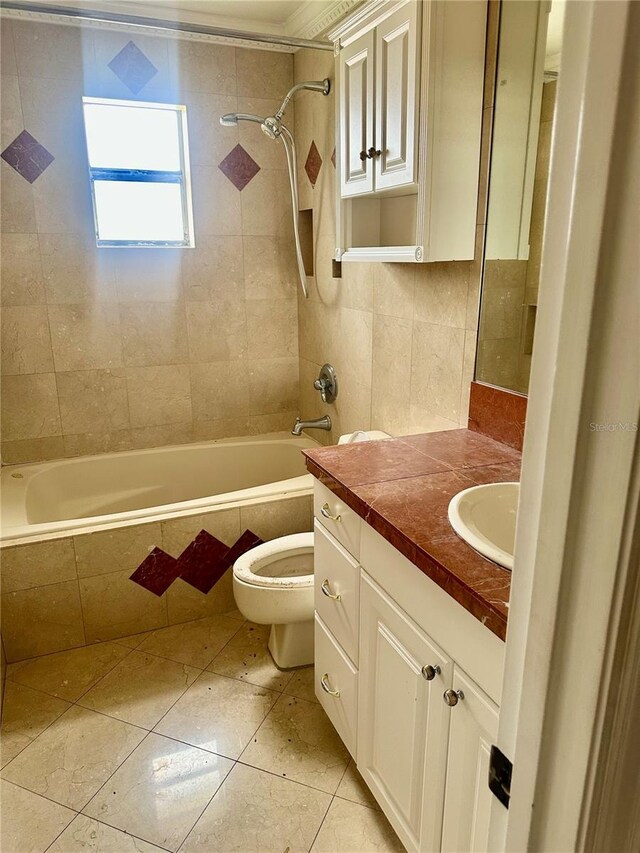 1096 Linkside Ct, Apopka, FL 32712 - full bathroom with tiled shower / bath, vanity, tile patterned floors, and tile walls