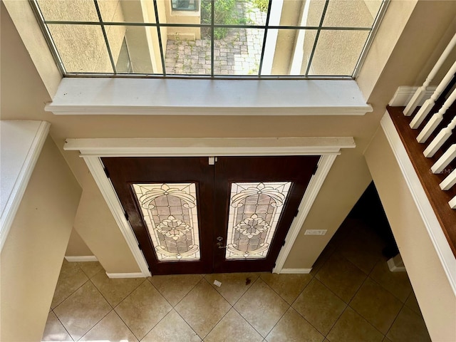 1096 Linkside Ct, Apopka, FL 32712 - tiled entryway featuring french doors and baseboards