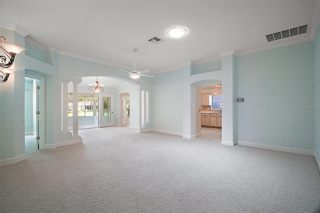 1512 Cervantes Pl, The Villages, FL 32159 - unfurnished room with crown molding, arched walkways, light colored carpet, a ceiling fan, and a chandelier