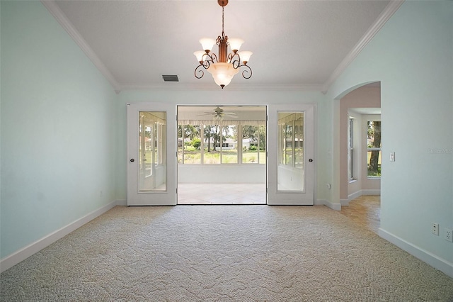 1512 Cervantes Pl, The Villages, FL 32159 - carpeted empty room featuring crown molding, healthy amount of natural light, arched walkways, a chandelier, and ceiling fan