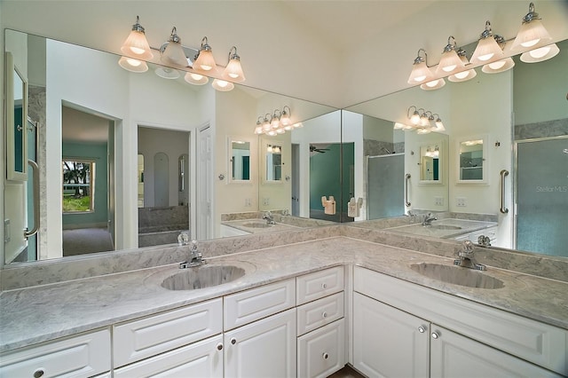 1512 Cervantes Pl, The Villages, FL 32159 - full bath featuring a shower stall, double vanity, and ceiling fan