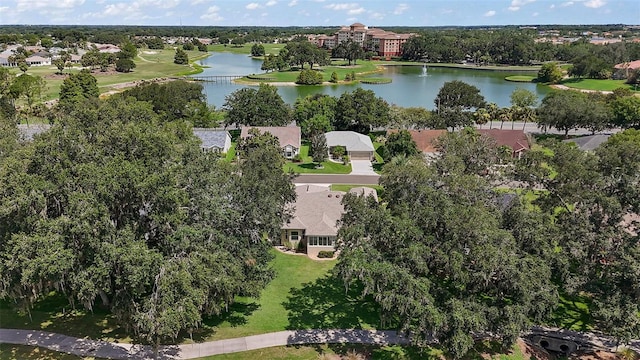 1512 Cervantes Pl, The Villages, FL 32159 - aerial perspective of suburban area featuring a large body of water and a golf course