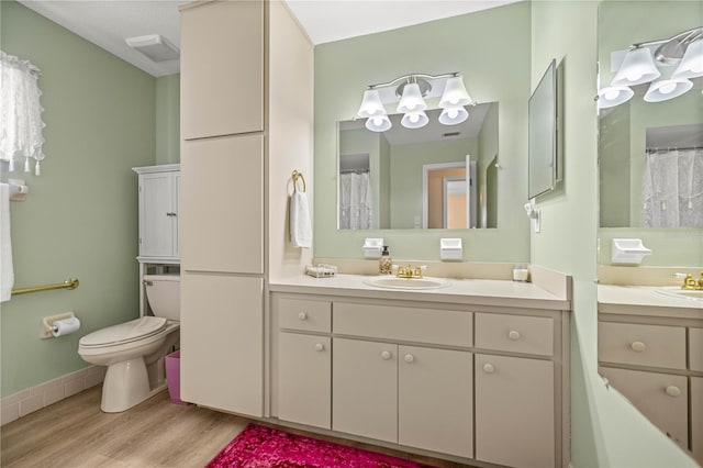 17970 SE 102nd Ct, Summerfield, FL 34491 - bathroom with wood finished floors and vanity