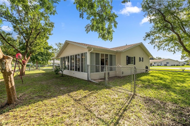 17970 SE 102nd Ct, Summerfield, FL 34491 - view of side of property with a sunroom and a gate