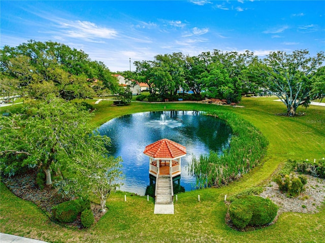 17970 SE 102nd Ct, Summerfield, FL 34491 - view of swimming pool featuring a water view, a lawn, and a gazebo