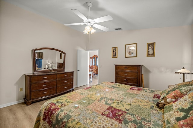 17970 SE 102nd Ct, Summerfield, FL 34491 - bedroom with light wood-style floors and ceiling fan