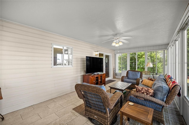17970 SE 102nd Ct, Summerfield, FL 34491 - sunroom featuring ceiling fan, an outdoor living space, and healthy amount of natural light