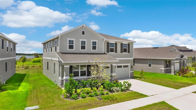 872 Griffon Ave, Lake Alfred, FL 33850 - view of front of home with a garage, concrete driveway, a front yard, and roof with shingles