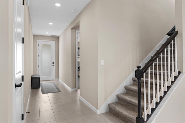 872 Griffon Ave, Lake Alfred, FL 33850 - entryway featuring recessed lighting, stairway, and light tile patterned floors