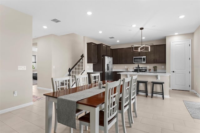 872 Griffon Ave, Lake Alfred, FL 33850 - dining room featuring recessed lighting and light tile patterned floors